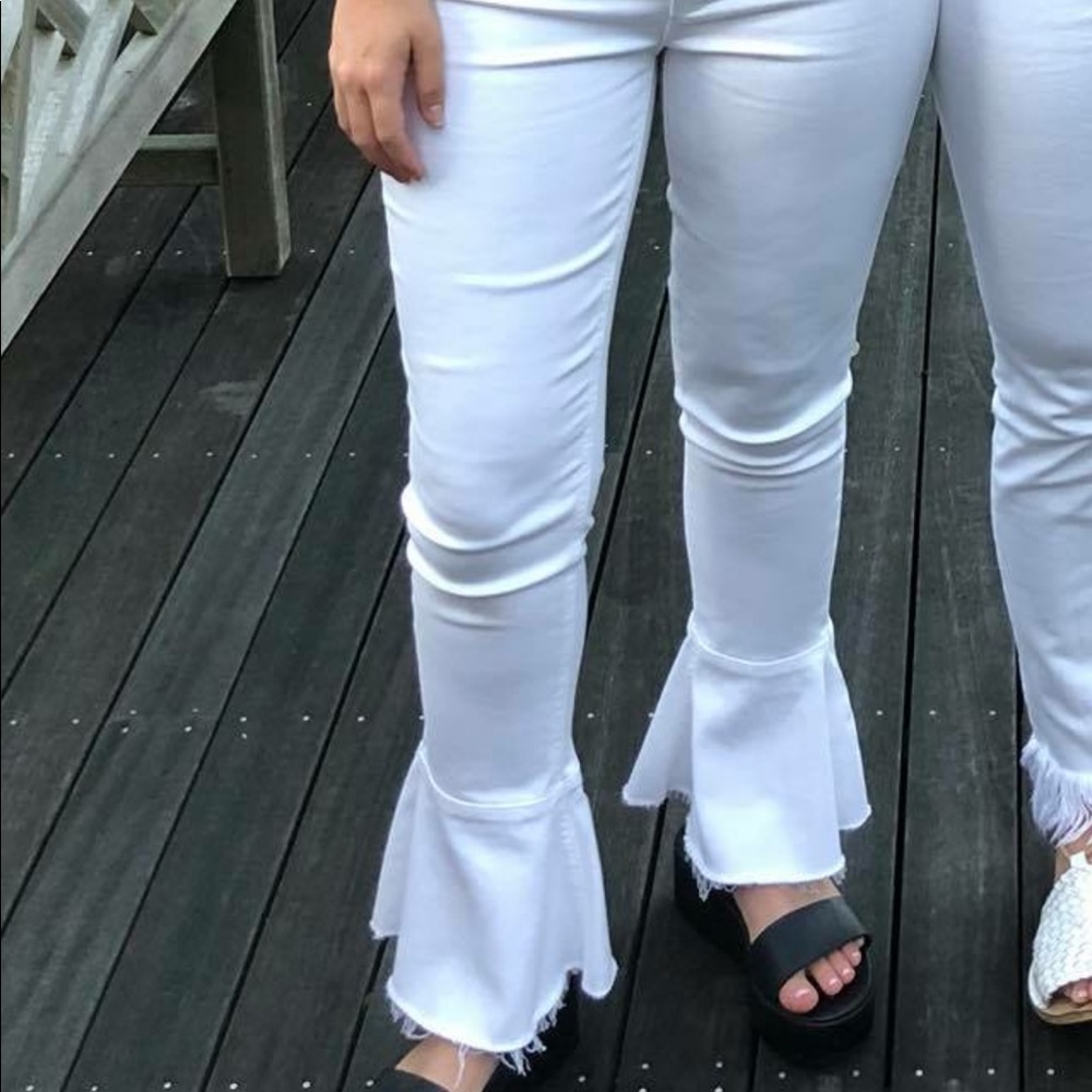White flare jeans